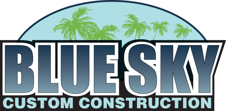 Logo of blue sky custom construction featuring palm trees and a stylized blue sky.